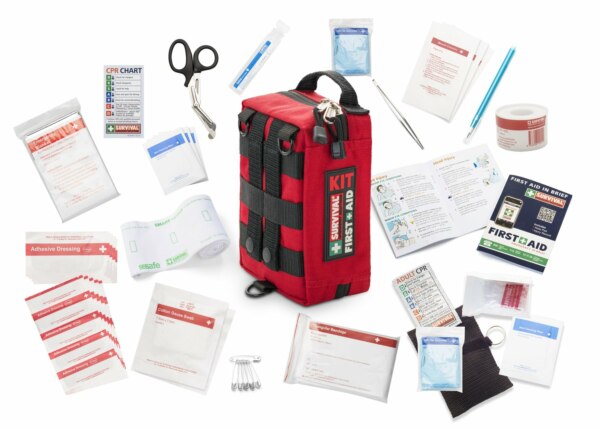 Survival Handy First Aid Kit and its contents spread out on a white background for survival handy.