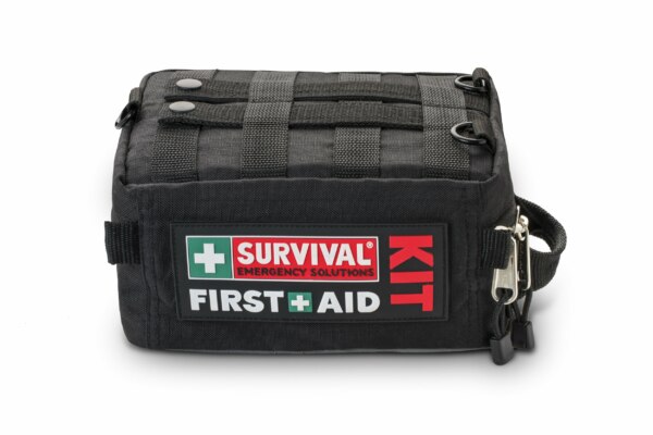 Survival Vehicle First Aid Kit with emergency solutions labels isolated on a white background.