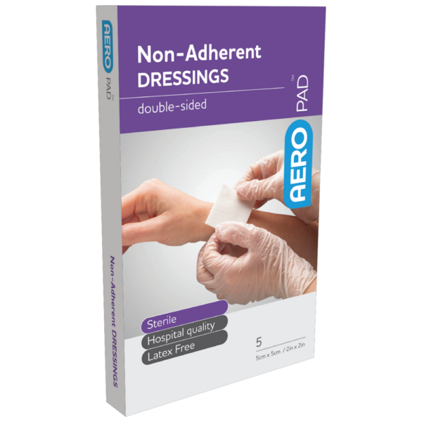 A box of sterile, double-sided AEROPAD Non-Adherent Dressing's with a visual of a person applying a dressing to a wound.