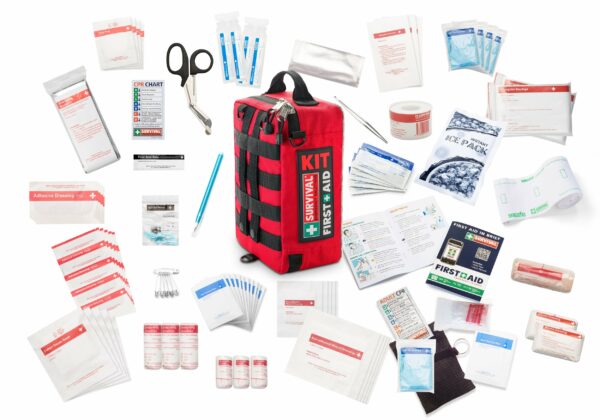 A first aid kit with various items on a white background.